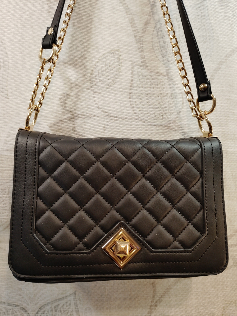 Black Quilted Crossbody Bag with Gold Hardware